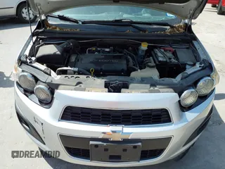 2014 Chevrolet Sonic LT with VIN 1G1JC5SH0E4210327, listed as a IAAI auction lot 42069313 with 94,506 mi miles and . Bid and sale history available at DreamBid. Image 10.