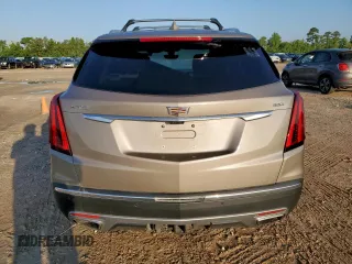 2022 Cadillac XT5 Premium Luxury FWD z VIN 1GYKNERS9NZ120517, wystawiony jako Copart lot #58978045 z przebiegiem 31 456 mil mil oraz Szkoda całkowita • Salvage title. Historia ofert i sprzedaży dostępna na DreamBid. Obrazek 6.