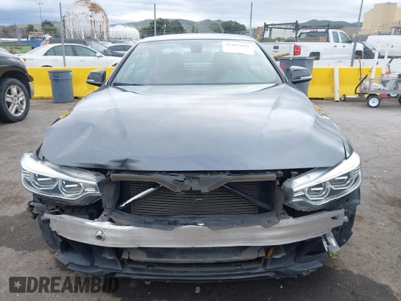 2015 BMW 4 Series 428i with VIN WBA3V7C54FP772531, listed as a IAAI auction lot 41487899 with 90,893 mi miles. Bid and sale history available at carsss.com. Image 13.