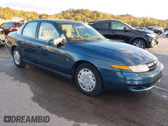 2002 Saturn LS z VIN 1G8JU54F22Y522311, wystawiony jako IAAI lot #40807065 z przebiegiem 209 242 mil mil oraz . Historia ofert i sprzedaży dostępna na DreamBid. Obrazek 1.