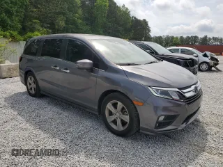 2019 Honda Odyssey EX-L z VIN 5FNRL6H72KB012691, wystawiony jako Copart lot #54739695 z przebiegiem 115 129 mil mil oraz Szkody całkowita. Historia ofert i sprzedaży dostępna na DreamBid. Obrazek 4.