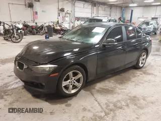 2015 BMW 3 Series 320i xDrive with VIN WBA3C3C54FK202055, listed as a IAAI auction lot 41658775 with 144,505 mi miles and . Bid and sale history available at DreamBid. Image 2.