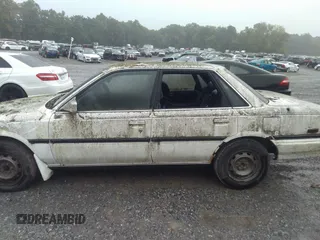 1991 Toyota Camry z VIN 4T1SV22E1MU450491, wystawiony jako IAAI lot #40356634 z przebiegiem 285 677 mil mil oraz . Historia ofert i sprzedaży dostępna na DreamBid. Obrazek 6.