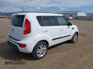 2012 Kia Soul + with VIN KNDJT2A62C7368475, listed as a IAAI auction lot 42103715 with 142,736 mi miles. Bid and sale history available at carsss.com. Image 4.