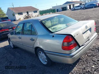 1997 Mercedes-Benz C with VIN WDBHA23E6VF506602, listed as a IAAI auction lot 42042704 with Not provided miles and . Bid and sale history available at DreamBid. Image 3.