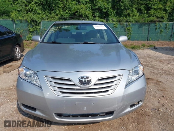 2007 Toyota Camry CE z VIN 4T1BE46K97U522294, wystawiony jako IAAI lot #42484284 z przebiegiem 150 683 mil mil oraz . Historia ofert i sprzedaży dostępna na DreamBid. Obrazek 6.