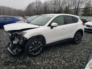 2016 Mazda CX-5 Grand Touring with VIN JM3KE4DY8G0728765, listed as a Copart auction lot 51625825 with 141,681 mi miles and Salvage Title. Bid and sale history available at carsss.com. Image 1.