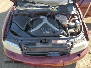 2000 Audi S4 z VIN WAUDD68DXYA127728, wystawiony jako Copart lot #75094394 z przebiegiem 164 612 mil mil oraz Szkody całkowita. Historia ofert i sprzedaży dostępna na DreamBid. Obrazek 12.