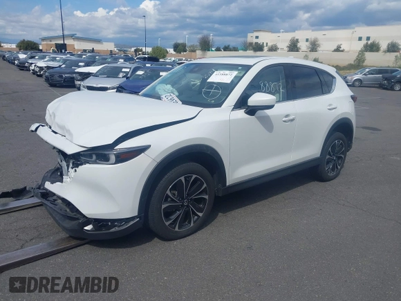 2023 Mazda CX-5 2.5 S Premium Plus Package with VIN JM3KFBEM4P0112803, listed as a IAAI auction lot 41588872 with 25,087 mi miles. Bid and sale history available at carsss.com. Image 2.