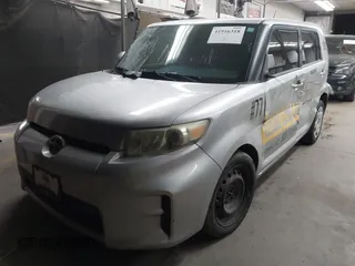 2012 Scion xB with VIN JTLZE4FE5CJ028608, listed as a IAAI auction lot 41916318 with 233,007 mi miles. Bid and sale history available at carsss.com. Image 2.