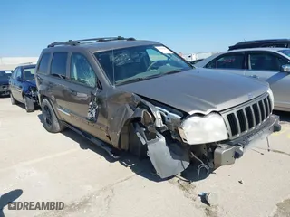 2005 Jeep Grand Cherokee Laredo with VIN 1J4HR48N35C647637, listed as a IAAI auction lot 38514345 with 167,342 mi miles. Bid and sale history available at carsss.com. Image 1.