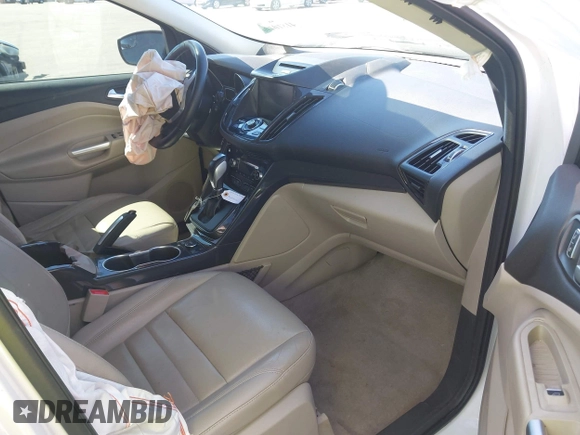 2015 Ford Escape Titanium with VIN 1FMCU0J94FUA69088, listed as a IAAI auction lot 41810406 with 167,749 mi miles. Bid and sale history available at carsss.com. Image 5.