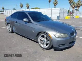 2010 BMW 3 Series 328i with VIN WBAWV1C51AP123689, listed as a IAAI auction lot 41966621 with 187,428 mi miles. Bid and sale history available at carsss.com. Image 1.