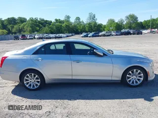 2014 Cadillac CTS Luxury AWD with VIN 1G6AX5S34E0124464, listed as a IAAI auction lot 42298607 with 89,351 mi miles and . Bid and sale history available at DreamBid. Image 13.