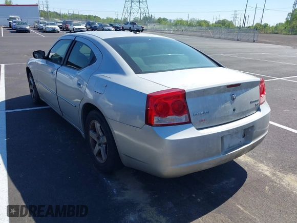 2010 Dodge Charger SXT with VIN 2B3CA3CV4AH253226, listed as a IAAI auction lot 42031664 with 173,785 mi miles. Bid and sale history available at carsss.com. Image 3.