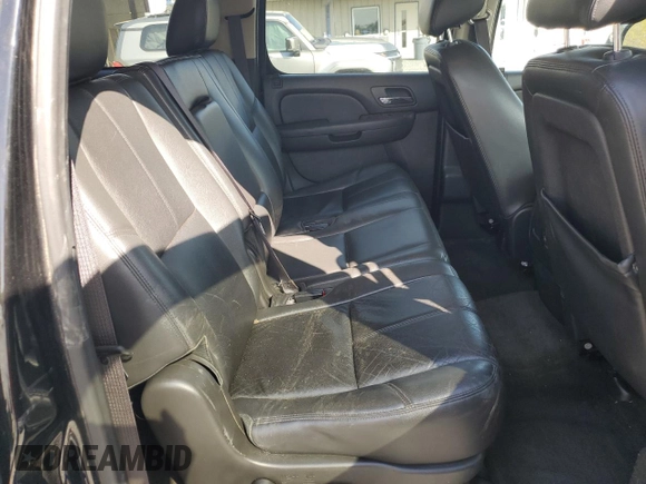 2013 GMC Yukon XL SLT z VIN 1GKS2KE77DR301715, wystawiony jako Copart lot #51524415 z przebiegiem 168 247 mil mil oraz Szkoda całkowita • Salvage title. Historia ofert i sprzedaży dostępna na DreamBid. Obrazek 11.