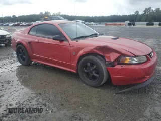 1999 Ford Mustang GT with VIN 1FAFP42X7XF145444, listed as a Copart auction lot 73089524 with 165,819 mi miles and Salvage Title. Bid and sale history available at carsss.com. Image 4.