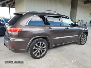 2017 Jeep Grand Cherokee Overland with VIN 1C4RJFCTXHC768687, listed as a Copart auction lot 51442495 with 123,578 mi miles and Clean Title. Bid and sale history available at carsss.com. Image 3.