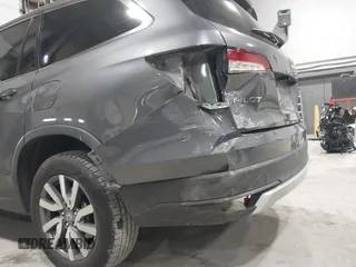 2019 Honda Pilot EX-L with VIN 5FNYF6H51KB099825, listed as a IAAI auction lot 42421688 with 51,370 mi miles and . Bid and sale history available at DreamBid. Image 6.