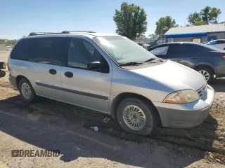 1999 Ford Windstar LX with VIN 2FMZA5140XBA04377, listed as a Copart auction lot 73172914 with 176,663 mi miles and Salvage Title. Bid and sale history available at carsss.com. Image 4.