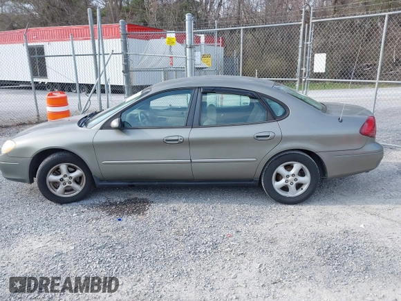 2002 Ford Taurus SE Standard with VIN 1FAFP53U72A145136, listed as a IAAI auction lot 41768868 with 209,765 mi miles and . Bid and sale history available at DreamBid. Image 14.