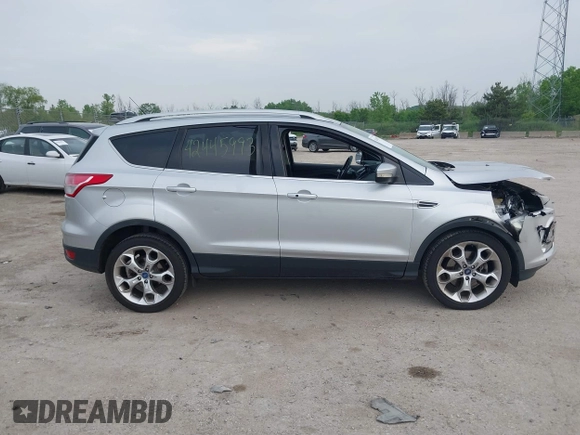 2013 Ford Escape Titanium with VIN 1FMCU9J97DUD16072, listed as a IAAI auction lot 42445993 with 111,255 mi miles and . Bid and sale history available at DreamBid. Image 13.