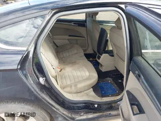 2019 Ford Fusion Hybrid SE with VIN 3FA6P0LU3KR273527, listed as a IAAI auction lot 41705167 with 169,020 mi miles. Bid and sale history available at carsss.com. Image 8.