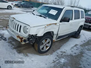 2014 Jeep Patriot Latitude with VIN 1C4NJPFA6ED502457, listed as a IAAI auction lot 41334385 with 160,600 mi miles and . Bid and sale history available at carsss.com. Image 2.
