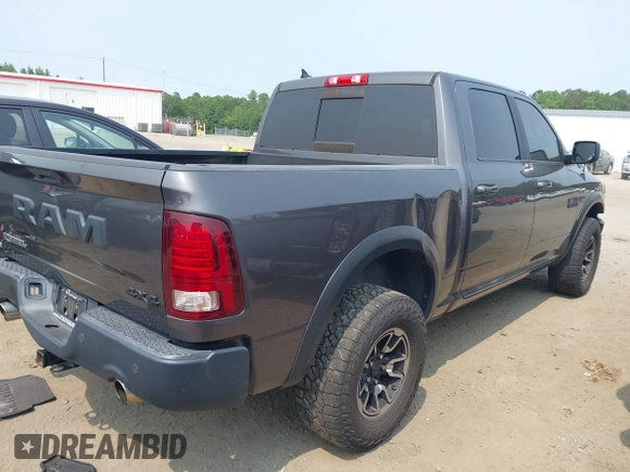 2017 Ram 1500 Rebel with VIN 1C6RR7YT6HS861839, listed as a IAAI auction lot 42407025 with 127,084 mi miles and . Bid and sale history available at DreamBid. Image 4.