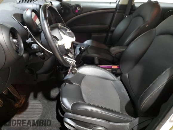 2016 MINI Countryman S with VIN WMWZC5C54GWT39755, listed as a Copart auction lot 50705915 with 133,466 mi miles and Salvage Title. Bid and sale history available at DreamBid. Image 7.