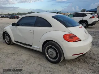 2012 Volkswagen Beetle 2.5L w/Sun PZEV with VIN 3VWJP7ATXCM631497, listed as a Copart auction lot 74442964 with 72,097 mi miles and Salvage Title. Bid and sale history available at carsss.com. Image 2.