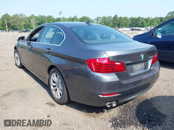 2015 BMW 5 Series 528i xDrive with VIN WBA5A7C57FD628557, listed as a IAAI auction lot 42519487 with 167,049 mi miles and . Bid and sale history available at DreamBid. Image 3.