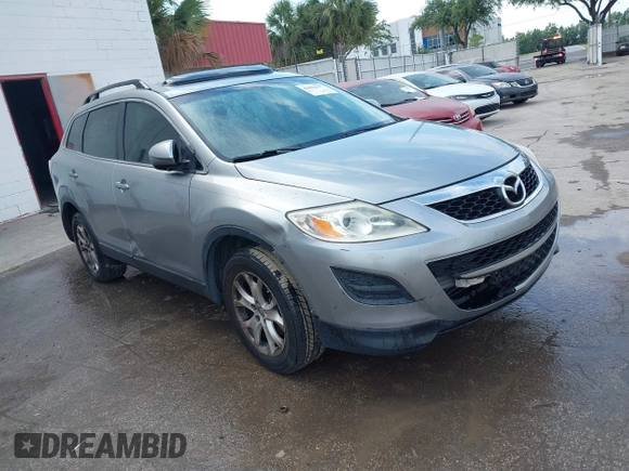 2012 Mazda CX-9 Touring with VIN JM3TB2CA3C0334249, listed as a IAAI auction lot 42092647 with 240,890 mi miles and . Bid and sale history available at carsss.com. Image 1.