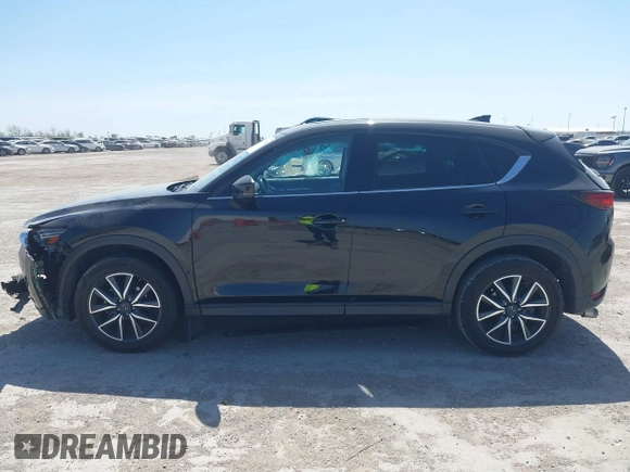 2018 Mazda CX-5 Grand Touring with VIN JM3KFADM8J0330035, listed as a IAAI auction lot 41878680 with 62,632 mi miles. Bid and sale history available at carsss.com. Image 15.