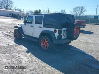 2016 Jeep Wrangler Unlimited Rubicon Hard Rock with VIN 1C4HJWFG9GL296782, listed as a IAAI auction lot 41595273 with 113,338 mi miles. Bid and sale history available at carsss.com. Image 3.