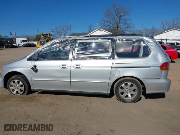 2004 Honda Odyssey EX-L with VIN 5FNRL18924B107971, listed as a IAAI auction lot 41699067 with Not Provided miles and . Bid and sale history available at DreamBid. Image 13.
