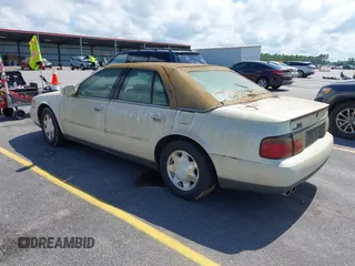 2001 Cadillac Seville Luxury SLS z VIN 1G6KS54Y81U110047, wystawiony jako IAAI lot #42436746 z przebiegiem 107 360 mil mil oraz . Historia ofert i sprzedaży dostępna na DreamBid. Obrazek 3.