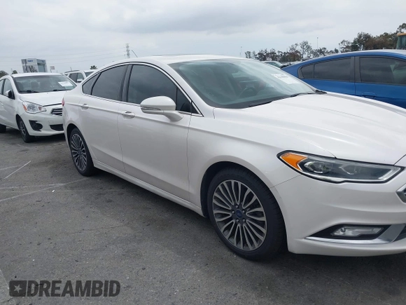 2017 Ford Fusion SE with VIN 3FA6P0HD0HR180188, listed as a IAAI auction lot 42146020 with 100,901 mi miles and . Bid and sale history available at DreamBid. Image 6.