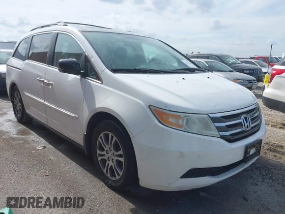 2011 Honda Odyssey EX-L with VIN 5FNRL5H60BB026171, listed as a IAAI auction lot 42511296 with 288,827 mi miles and . Bid and sale history available at DreamBid. Image 1.
