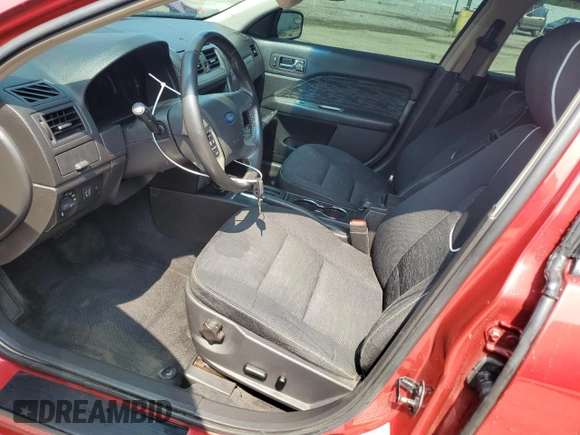 2012 Ford Fusion SE with VIN 3FAHP0HG4CR353948, listed as a Copart auction lot 60204695 with 151,432 mi miles and Salvage title. Bid and sale history available at DreamBid. Image 7.