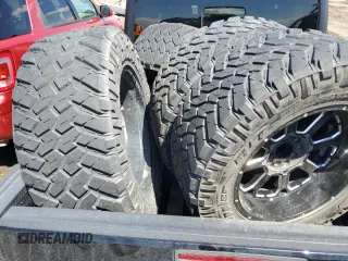 2023 Jeep Gladiator Rubicon with VIN 1C6JJTBG7PL573197, listed as a Copart auction lot 53866075 with 19,521 mi miles and Salvage title. Bid and sale history available at DreamBid. Image 12.