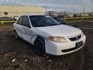 2001 Mazda Protege DX with VIN JM1BJ222410441812, listed as a Copart auction lot 88330565 with 169,447 mi miles and Salvage Title. Bid and sale history available at carsss.com. Image 11.