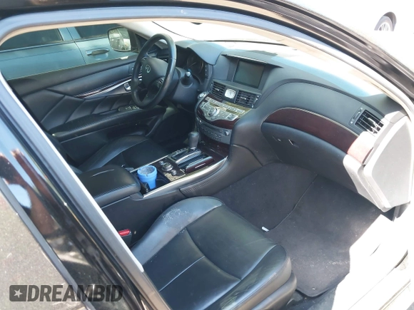 2011 Infiniti M with VIN JN1BY1APXBM324672, listed as a IAAI auction lot 42214163 with 187,424 mi miles. Bid and sale history available at carsss.com. Image 5.