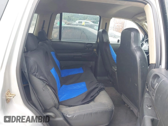 2003 Dodge Durango Sport with VIN 1D4HR38N73F585402, listed as a IAAI auction lot 42490753 with 186,190 mi miles and . Bid and sale history available at DreamBid. Image 8.