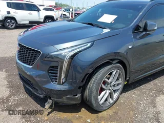 2021 Cadillac XT4 FWD Sport with VIN 1GYFZER41MF079193, listed as a IAAI auction lot 42331594 with 72,287 mi miles and . Bid and sale history available at DreamBid. Image 6.