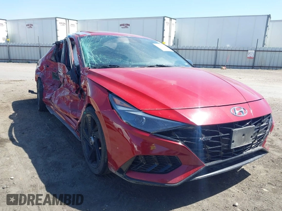 2021 Hyundai Elantra N Line z VIN KMHLR4AF7MU147407, wystawiony jako IAAI lot #42313077 z przebiegiem 124 298 mil mil oraz . Historia ofert i sprzedaży dostępna na DreamBid. Obrazek 1.