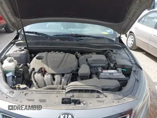 2015 Kia Optima EX with VIN 5XXGN4A70FG442402, listed as a IAAI auction lot 42260968 with 94,512 mi miles and . Bid and sale history available at DreamBid. Image 10.