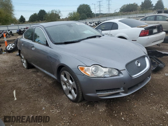 2009 Jaguar XF with VIN SAJWA07C991R41110, listed as a Copart auction lot 73204964 with 147,727 mi miles and Salvage Title. Bid and sale history available at DreamBid. Image 4.