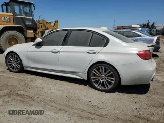 2013 BMW 3 Series 335i xDrive with VIN WBA3B9C56DF586996, listed as a Copart auction lot 58871035 with 139,153 mi miles and Salvage title. Bid and sale history available at DreamBid. Image 2.