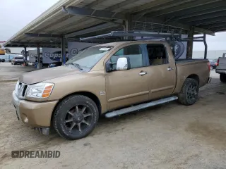 2004 Nissan Titan LE with VIN 1N6AA07A54N554415, listed as a Copart auction lot 54571635 with 196,664 mi miles and Clean Title. Bid and sale history available at carsss.com. Image 1.